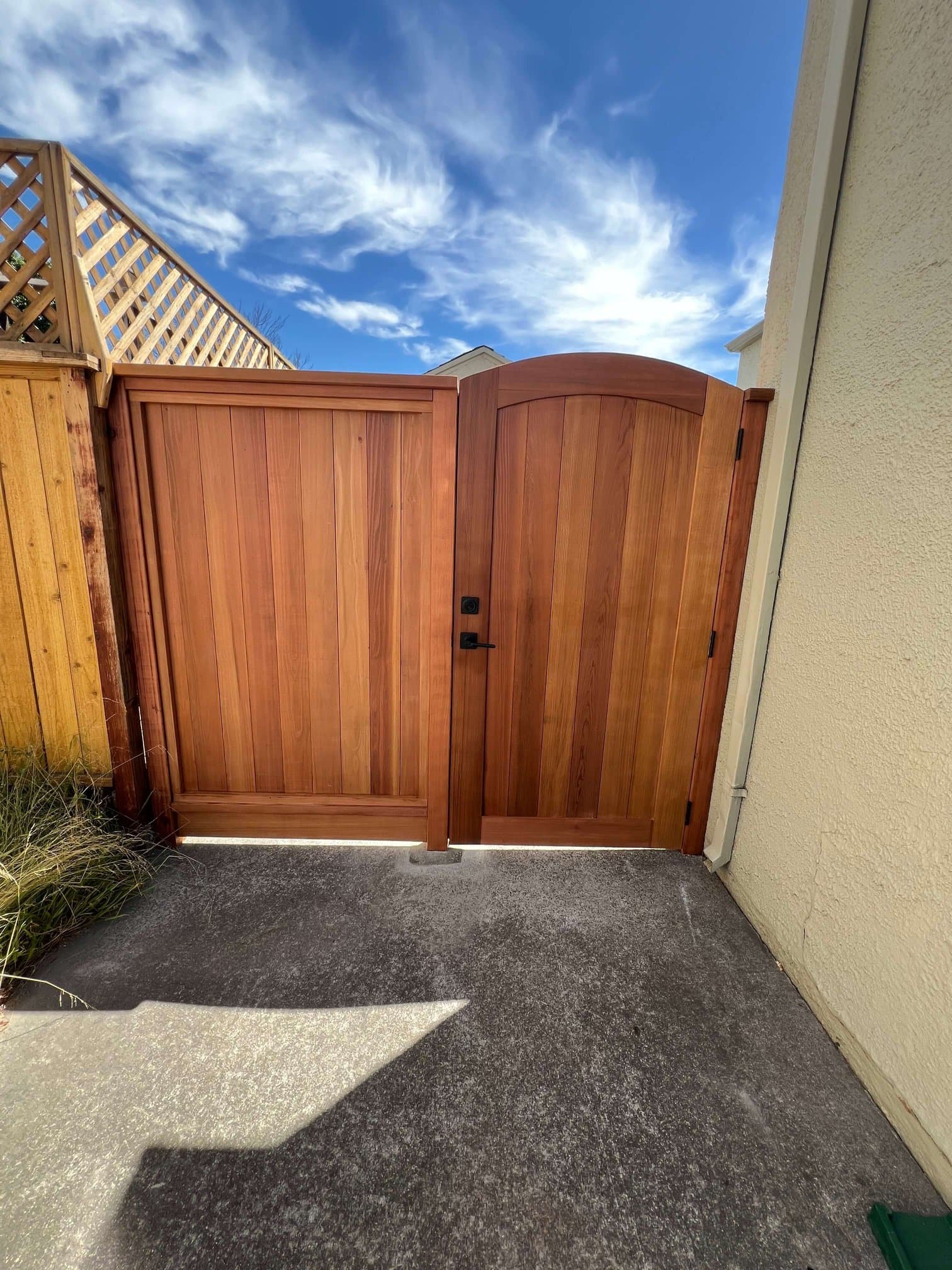 Custom cedar fence with a matching pedestrian gate